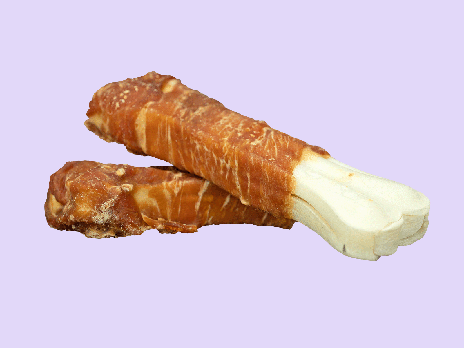 Braaaf Rawhide Snacks Kippenbot uitgestald – twee hondenkauwbotjes van rawhide met kippenfilet op lila achtergrond